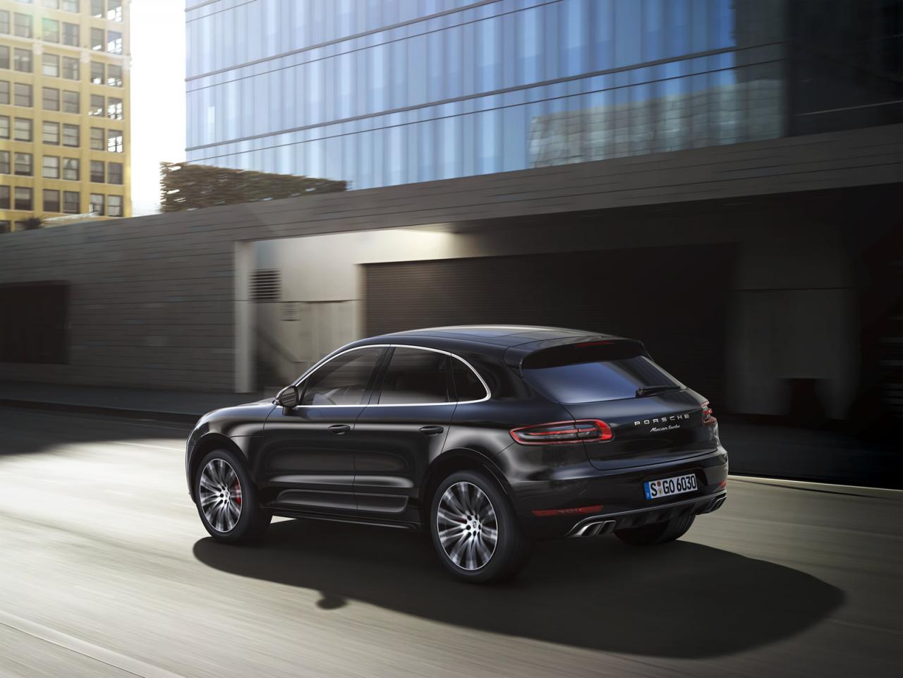 2014 Porsche Macan Exterior Black Rear and Side Driving View